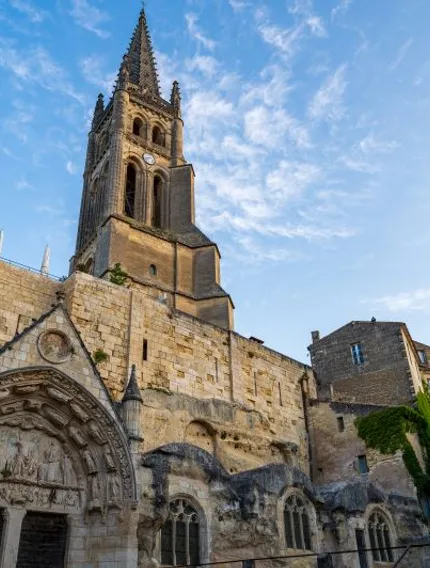 Discover the underground Monolithic Church of Saint-Émilion, its medieval origins, limestone architecture, and connection to the Bordeaux wine landscape.